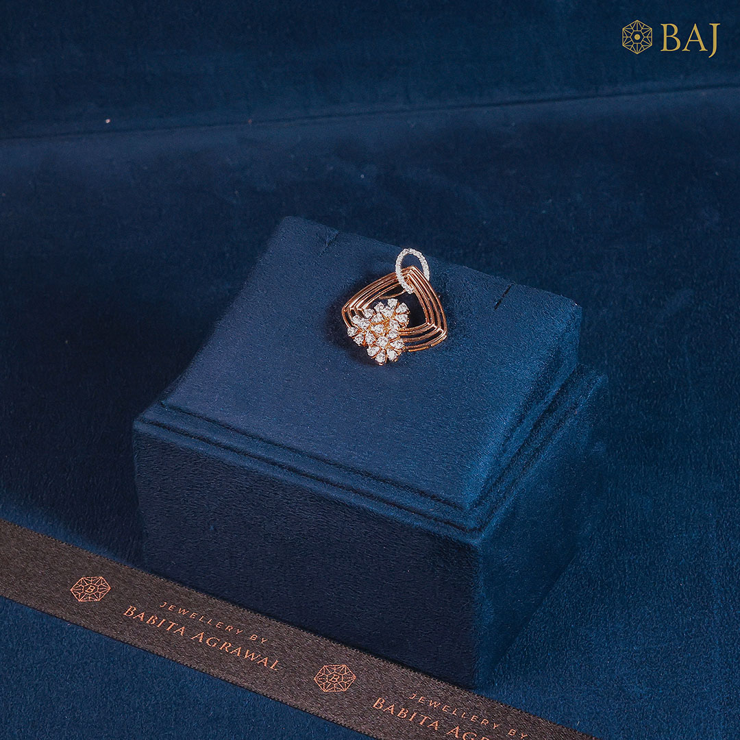 Petal Twist diamond pendant in 18k gold with floral diamond cluster and swirling gold design