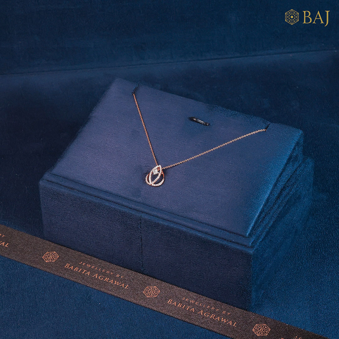 Infinity Loop diamond pendant with chain in 18k gold featuring interlocked infinity loops with diamonds