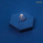 Pop up diamond ring in 18kt rose gold with raised cluster setting