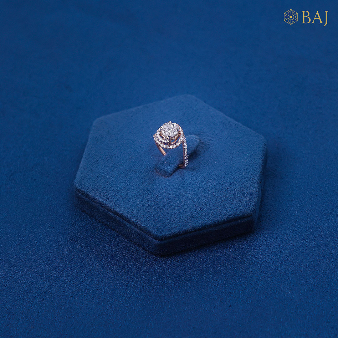 Halo Star diamond ring in 18kt rose gold with elevated halo cluster