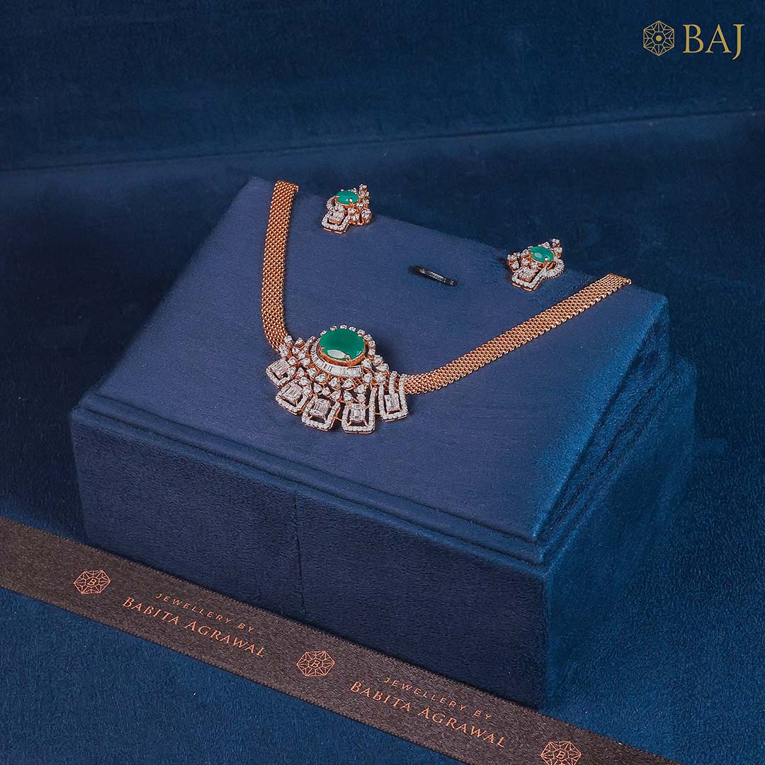 Designer emerald center diamond necklace and earrings in 18kt gold