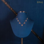 Delicate flower motif diamond necklace set in 18kt gold