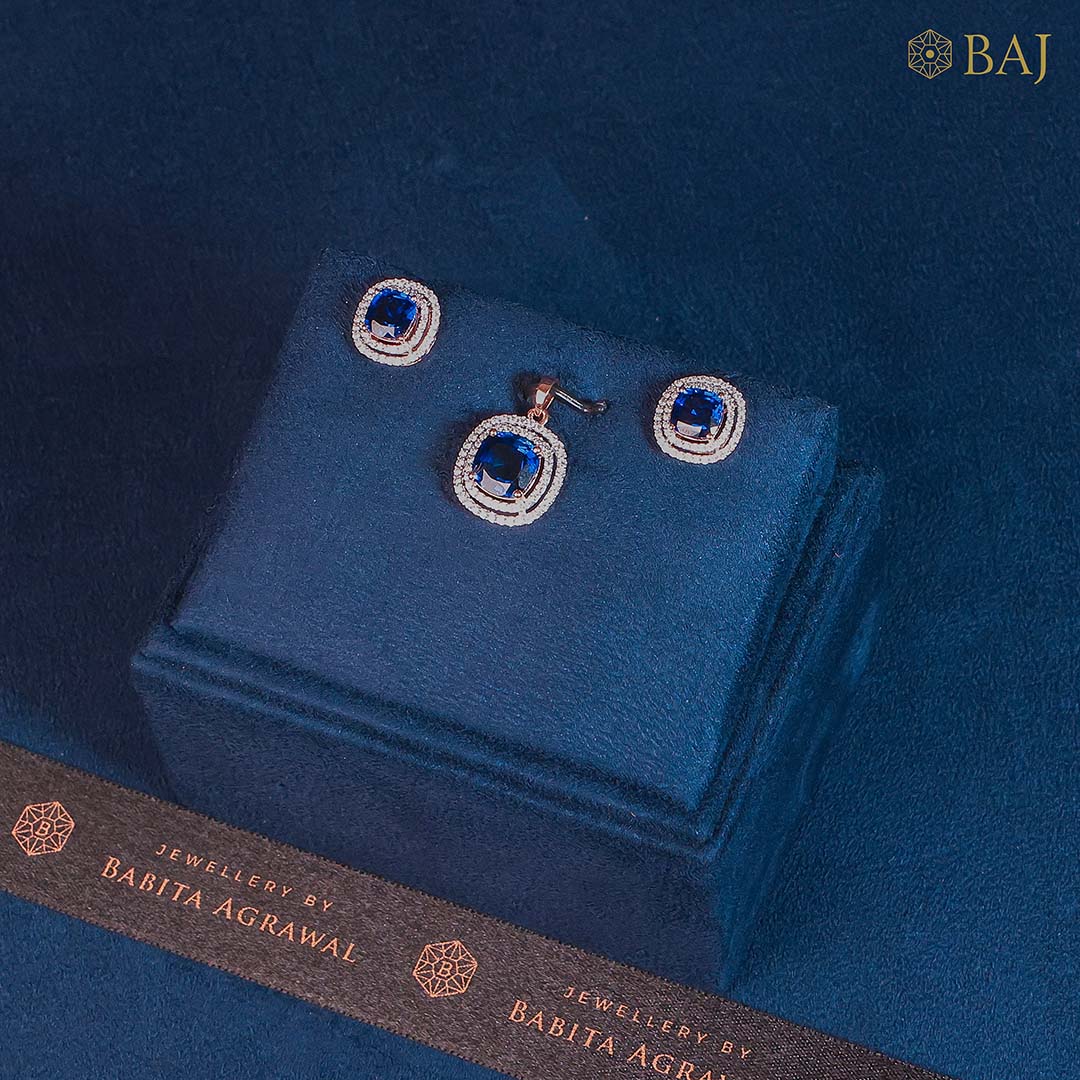 Royal Velvet Spark diamond pendant set with blue gemstone in 18k gold