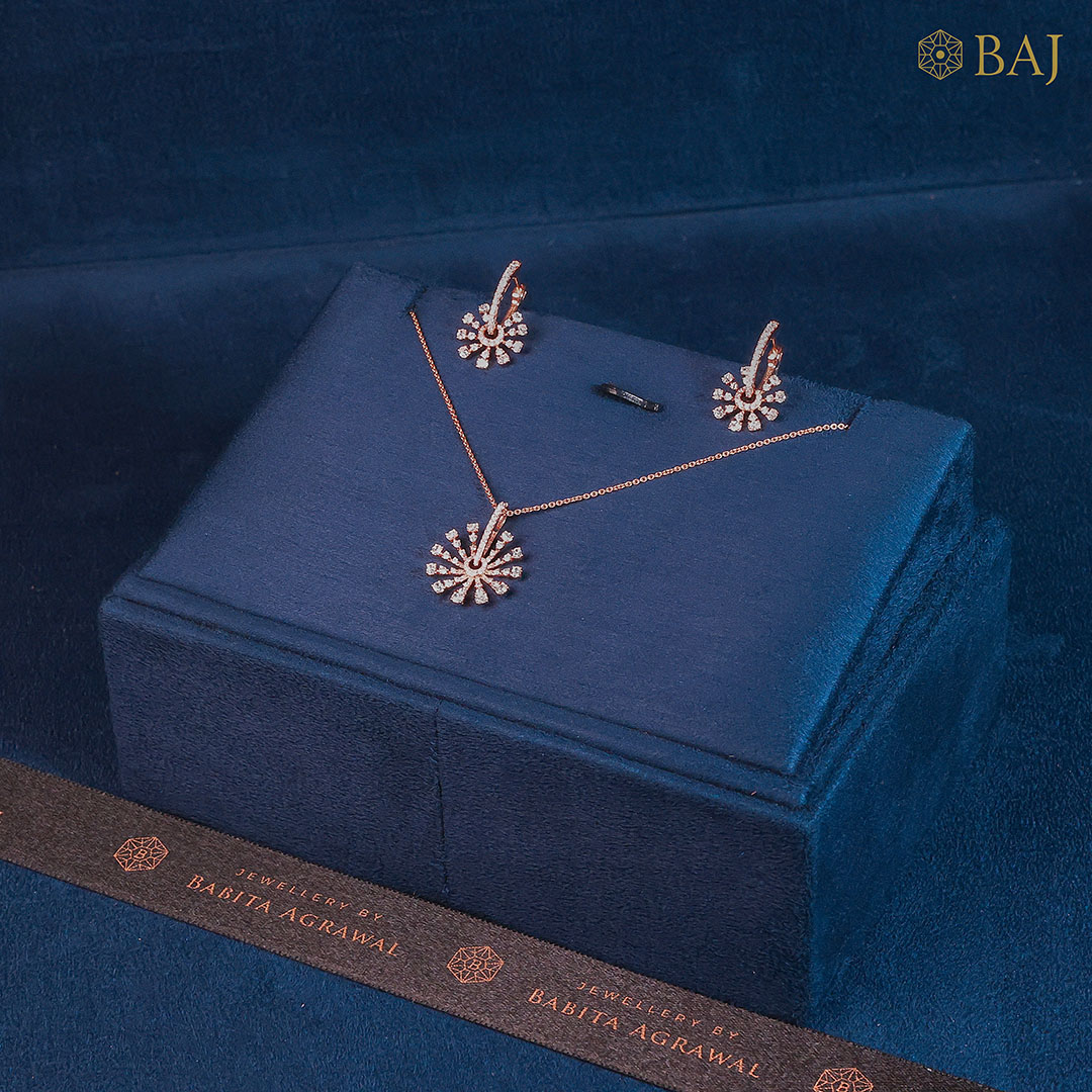 Starlit Glow diamond pendant set with starburst design in 18k gold