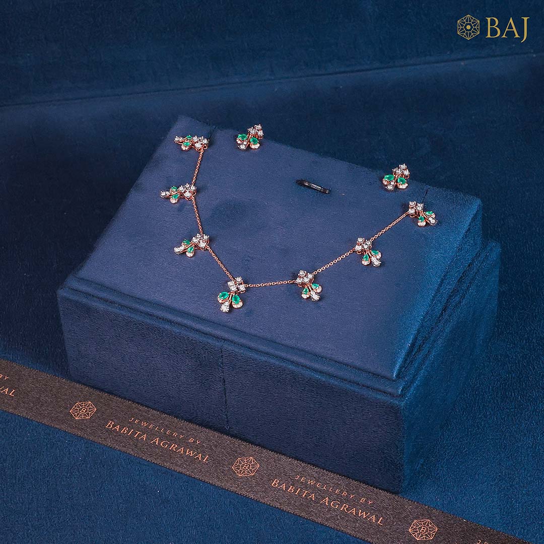 Floral Shine diamond necklace set with green gemstone accents in 18k gold