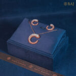 Radiant Crescent diamond pendant set in 18k gold with crescent design