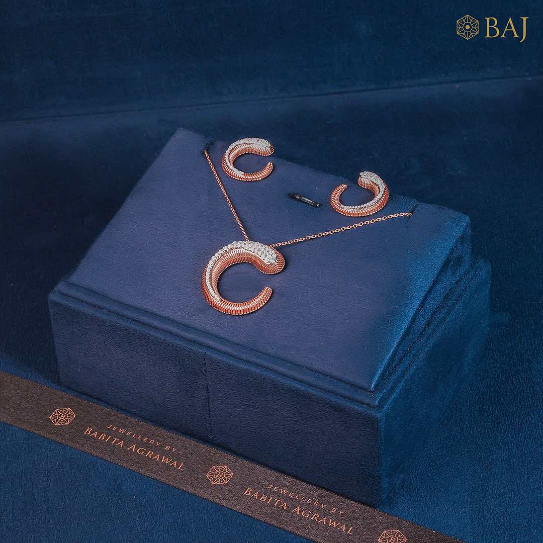 Radiant Crescent diamond pendant set in 18k gold with crescent design