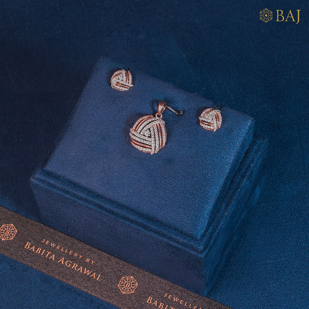 Twist Allure diamond pendant set in 18k gold with matching earrings