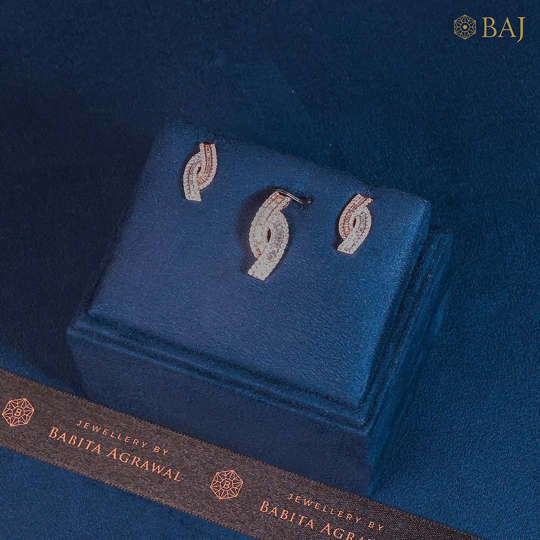 Elegant Curve diamond pendant set in 18k gold with matching earrings