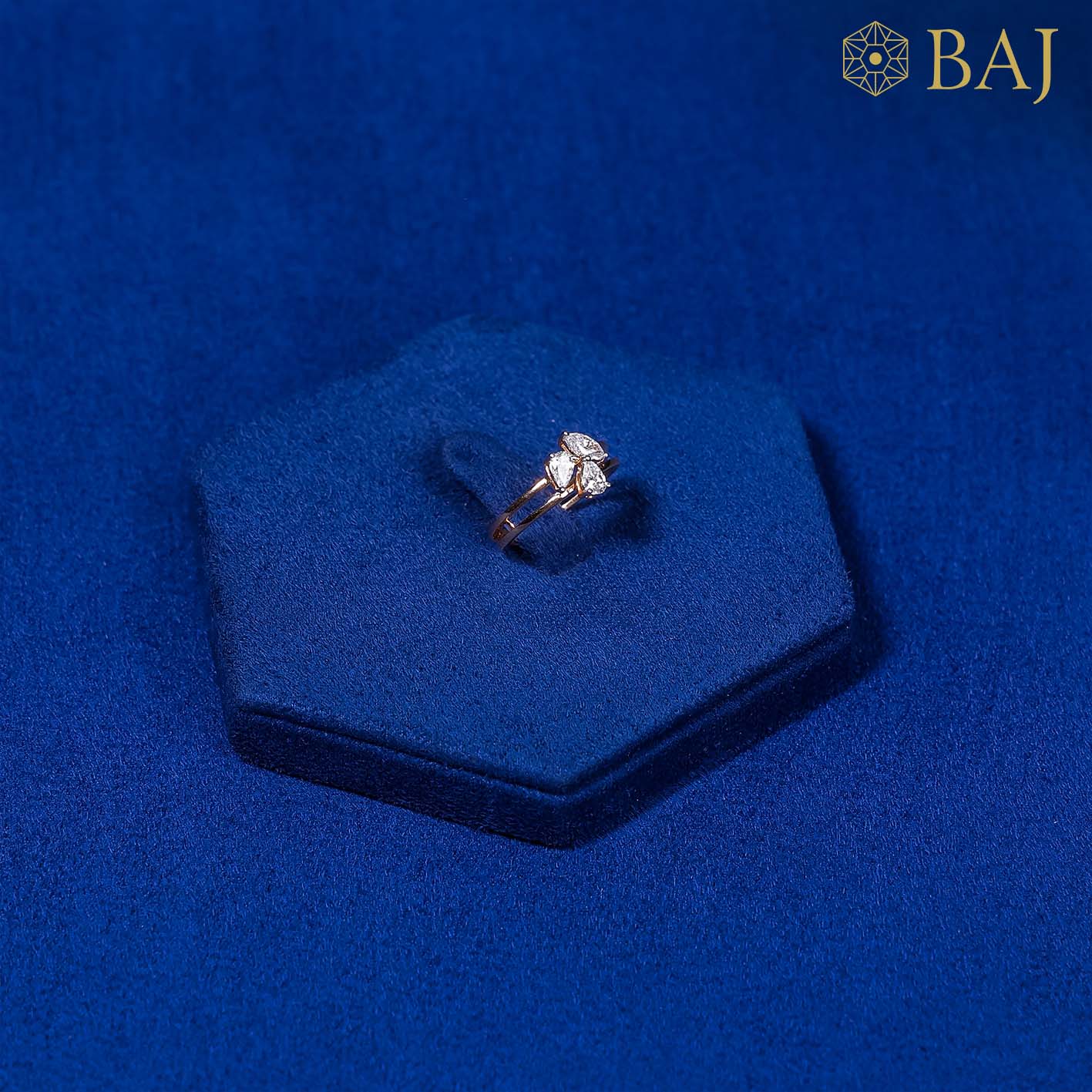 Diamond ring with marquise diamond cluster