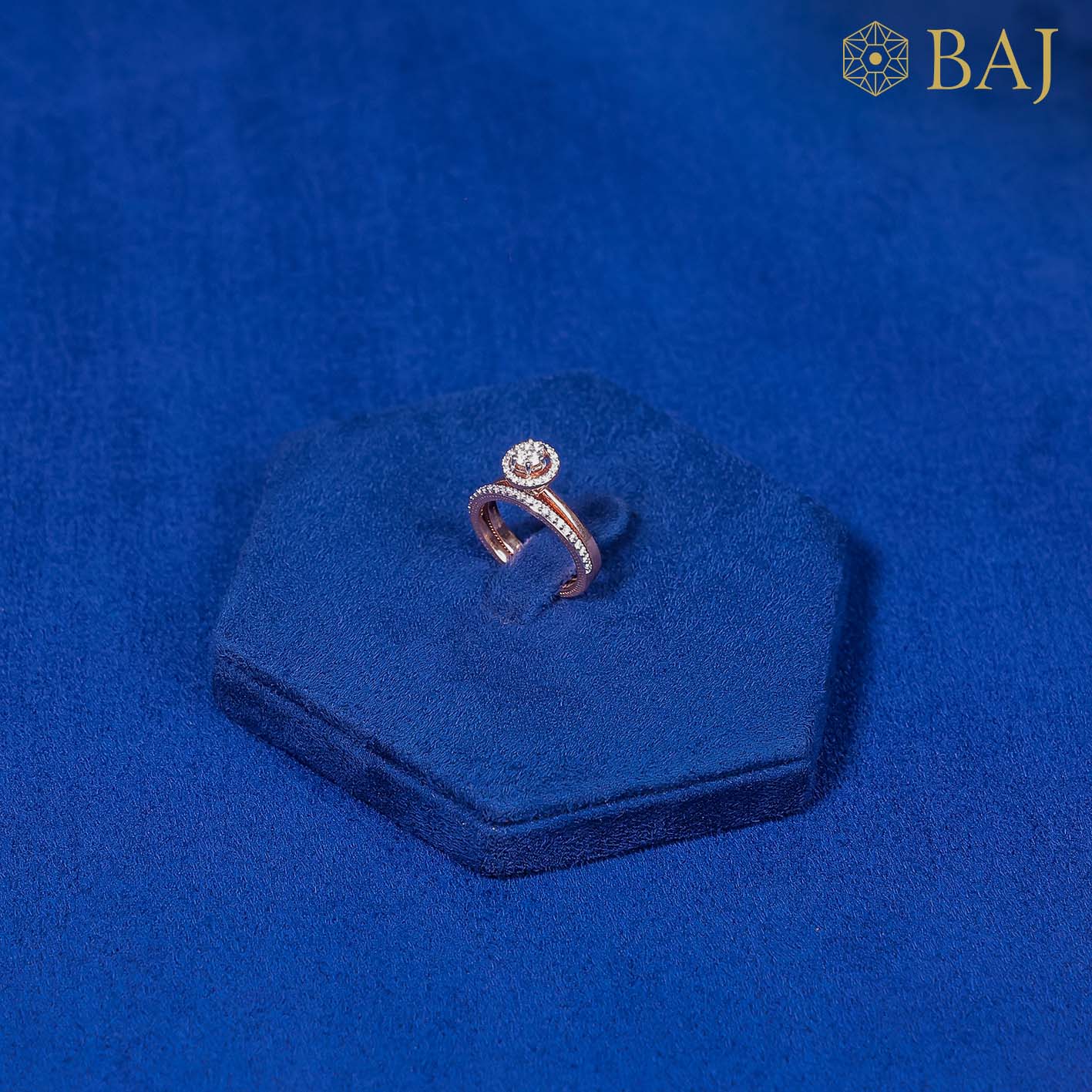 Surity diamond ring in 18kt rose gold with halo solitaire design