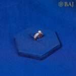 Solitaire diamond ring in 18kt rose gold with pavé band